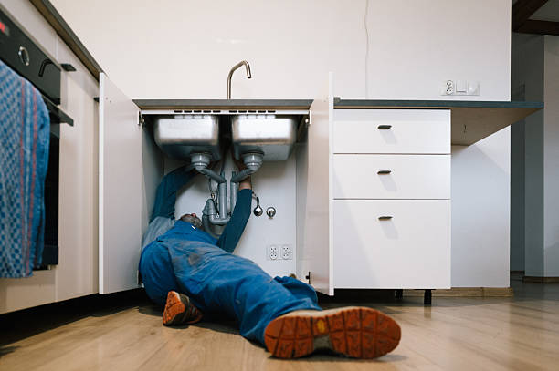 Professional Drain Cleaning technician working in Woodville, OH